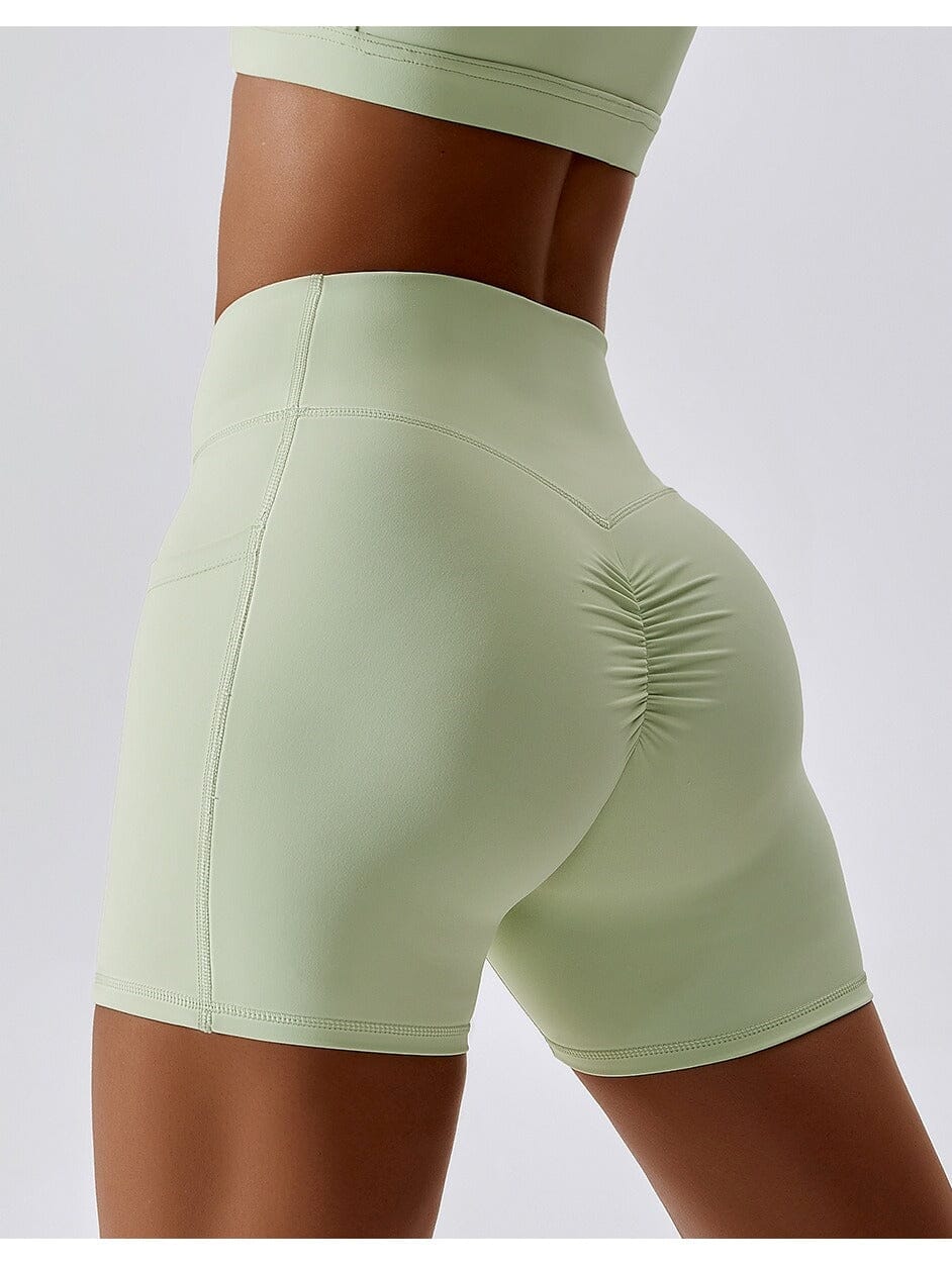 Short Sport Push Up Poches Latérales Shorts helankezatrening.com sa Vert pastel